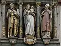 Statues des trois saints patrons de Bâle : Henri II, la Vierge Marie portant l'enfant Jésus, et Saint Pantale ; sur le "Basler Hof" (présidence du gouvernement) de Fribourg-en-Brisgau