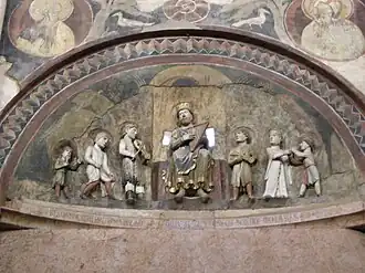 tympan I, au-dessus de la porte ouest, David jouant de la musique