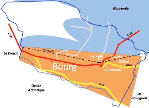 Schéma montrant l’implantation d’une ville bordée par la mer et des marais.
