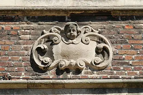 Cartouche à tête d'angelot.