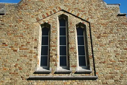 Triplet d'arcs en mitre du transept.