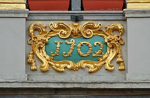 Cartouche «&nbsp;1702&nbsp;».