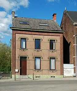 Façade en cimorné à Ottignies.