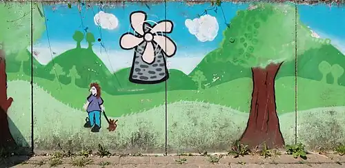 Sentier de la gare : fresque de l'Atelier au Couleurs du Monde.