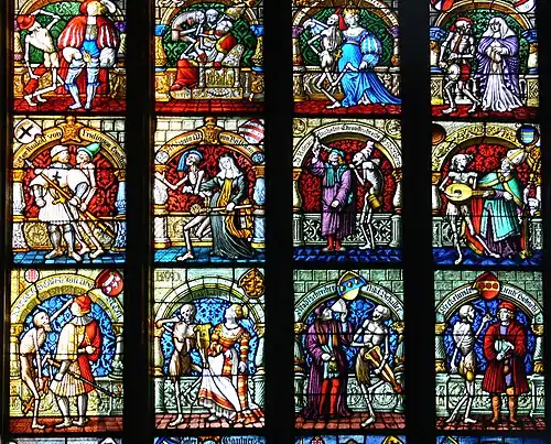 Vitrail Danse macabre, Collégiale Saint-Vincent de Berne, avec blason de Diesbach (rangée du bas, deuxième de gauche).