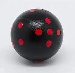 Dé à 6 faces sphérique.