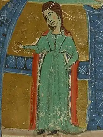 Enluminure en couleurs représentant une femme debout, vêtue d'une robe verte et d'une cape rouge, regardant vers la gauche et tendant la main.