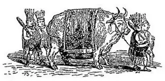 Gravure figurant un bœuf entouré par quatre hommes torse-nus et ventrus tenant un gourdin et coiffés de plumes