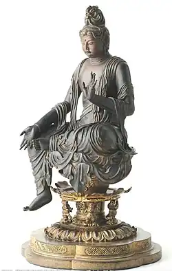 Bosatsu assis en délassement. Fin VIIIe&nbsp;siècle. Bois peint, H. 124&nbsp;cm. Hobodaiin Gantokuji. Kyoto.