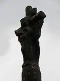 Le calvaire : partie sommitale (statue de sainte Cécile).