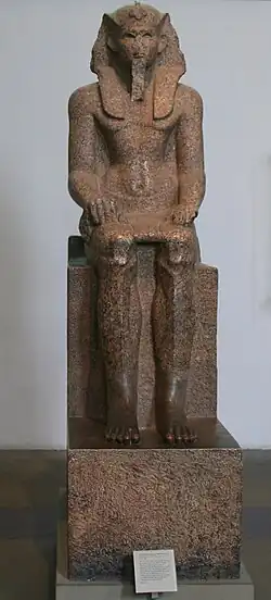 Statue en granit rouge du roi Sekhemrê-Ouadjkhâou Sobekemsaf, aujourd'hui au British Museum.