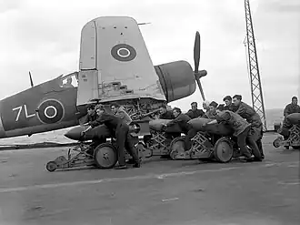 Description de l'image British naval personnel moving bombs before a raid during Operation Goodwood.jpg.