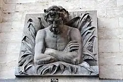 Le Cracheur, copie en pierre bleue du buste de la Fontaine Le Cracheur, Bruxelles, vers 1890.