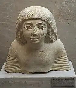 Buste de fonctionnaire. Époque de Ramsès II, XIXe dynastie. Calcaire