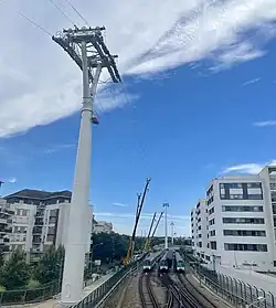 Installations du câble 1 en construction à Pointe du Lac.