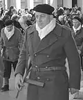 Comédien en béret lors de la reconstitution du défilé, le 11 novembre 2013 (70e&nbsp;anniversaire).