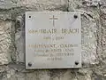 La plaque commémorant la libération par John Blair Beach en 1944.