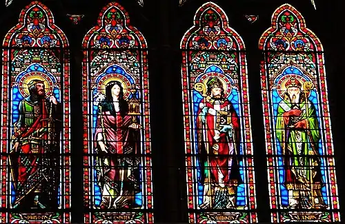 Vitraux de saint Namphase, sainte Spérie, saint Ambroise, saint Urcisse.