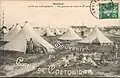 Camp de Coëtquidan ː vue générale des tentes et du camp vers 1910 (carte postale).