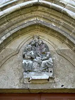 Le tympan avec les 4 Évangélistes.