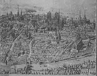 Reims au XIVe siècle, en haut à droite avec ses deux tours, l'abbaye derrière la cathédrale.