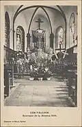 Carte postale représentant l'intérieur de l'église des Vallois, à l'occasion de la Mission 1930. Les Vosges pittoresques.