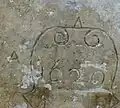La date inscrite sur la croix du cimetière.