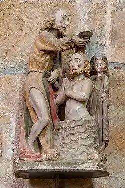 Groupe sculpté du Baptême du Christ (pierre polychrome, 15e&nbsp;siècle).