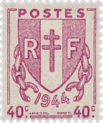 Photographie d'un timbre postal imprimé en rose.