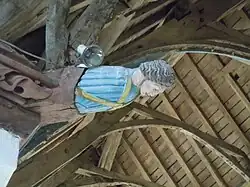 Blochet sculpté : Buste d'angelot.