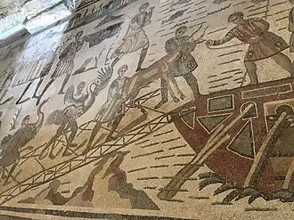 Les animaux sont chargés sur une galère pour être emmenés à Rome en vue des jeux du cirque.