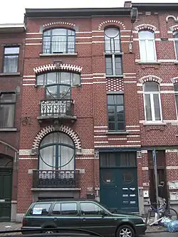 Maison Lequy en rue Zénobe Gramme n° 22 par Octave Carpet