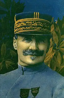 Dessin en couleurs d'un homme, de face, en tenue militaire et portant un képi.