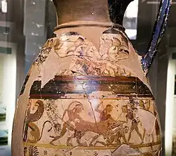 Olpe protocorinthien à figures noires anciennes : le chasseur lève la main afin de transpercer le lion ;  chasse au lion, au renard et au lièvre. Corinthe, ca. -650. Véies, tumulus de Monta Aguzzo (Formello), inv. 22679