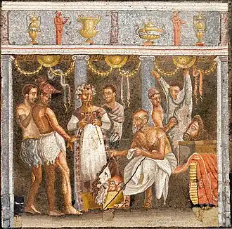 Acteurs et musiciens se préparant, mosaïque de la Maison du Poète tragique à Pompéi, Musée archéologique national de Naples.
