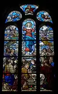 L'église Saint-Pierre, vitrail du transept nord : l'Assomption de la Vierge.