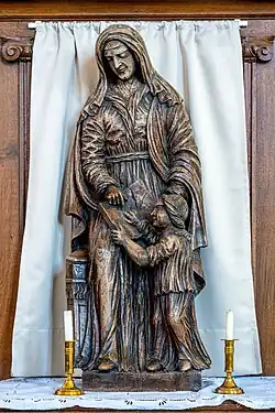 Statue de Sainte Anne apprenant à lire à la Vierge.