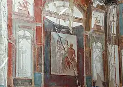 mur avec fresque de panneaux illustrés sur fond rouge