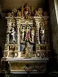 Enclos paroissial de Commana : église Saint-Derrien, le retable des Cinq Plaies.