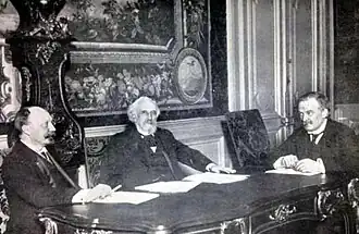 Sont présents les ministres des Finances de France, Alexandre Ribot et de la Russie Peter Bark ainsi que le Chancelier de l'Échiquier Britannique David Lloyd George.
