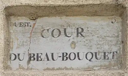 Plaque avec indication du 5ème arrondissement de la ville au cours de la première moitié du XIXe&nbsp;siècle