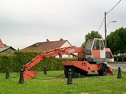 Pelle mécanique hydraulique Poclain, inventée par Gérard Coolen, promotion 1937, Jacques Bataille, promotion 1944, et Pierre Bataille, promotion 1945