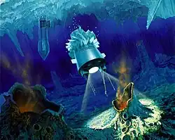 On observe la couche de glace au-dessus de l'océan. Un cryobot a percé la glace. Au premier plan, une sonde éclaire le sol.