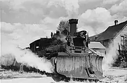 Locomotive avec chasse-neige de chemin de fer à voie étroite, Telluride, Colorado. 1940