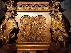 Panneau central représentant Jésus au temple discutant avec les docteurs de la loi.