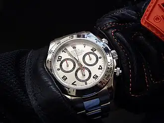 Montre chronographe Daytona, Rolex, destinée aux pilotes automobiles.