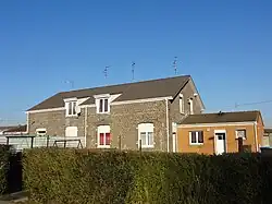 Des habitations groupées par quatre.