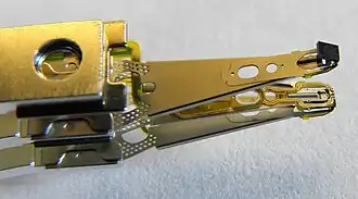 Têtes d'un disque dur.