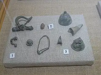 Pièces métalliques exposées au Musée Archéologique de Moncada trouvées dans le site ibérique de Tos Pelat