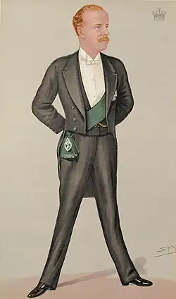Caricature d'un homme aux cheveux blonds avec une moustache portant un élégant costume avec une écharpe verte portée sous la veste